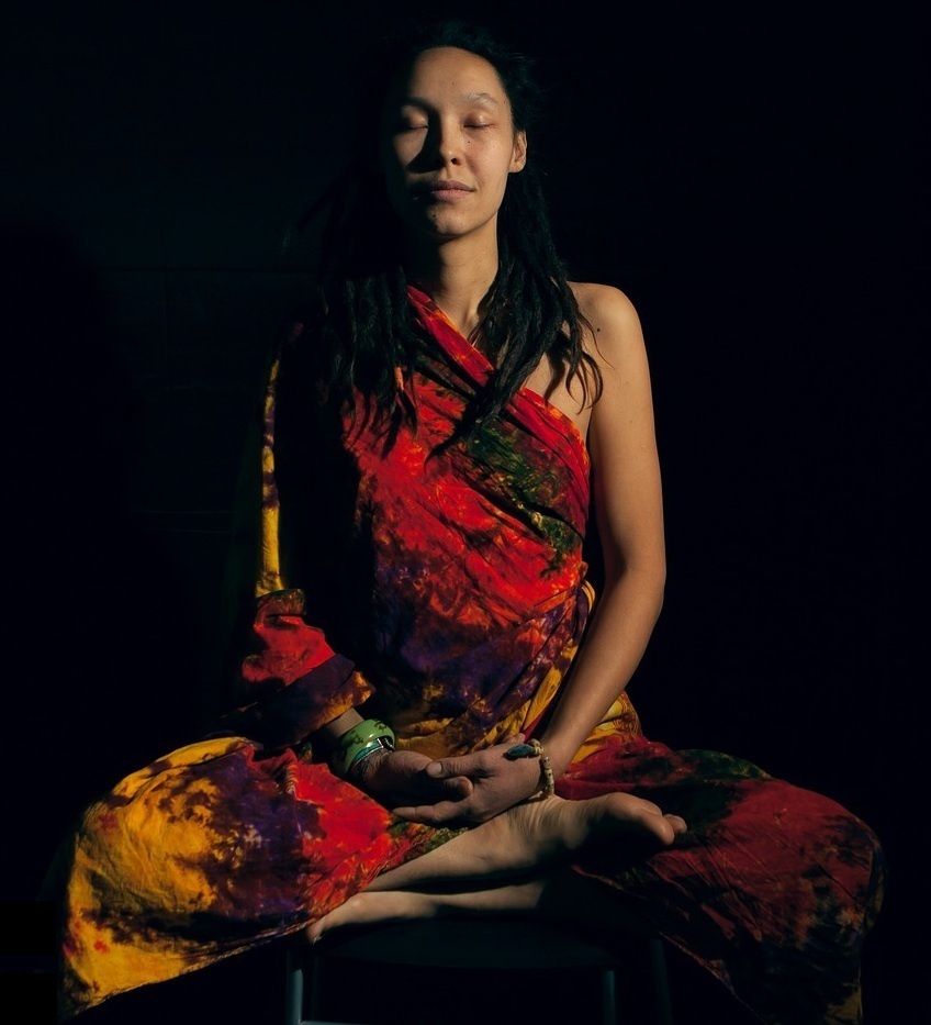 Image showin woman meditating Woman meditating